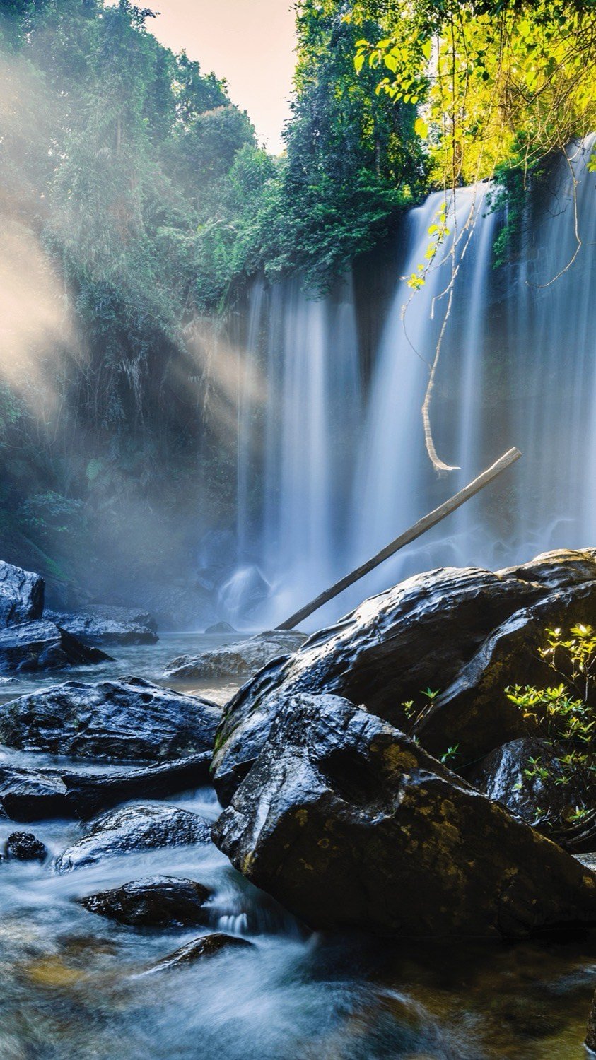 Water falling into the pool at Phnom Kulen