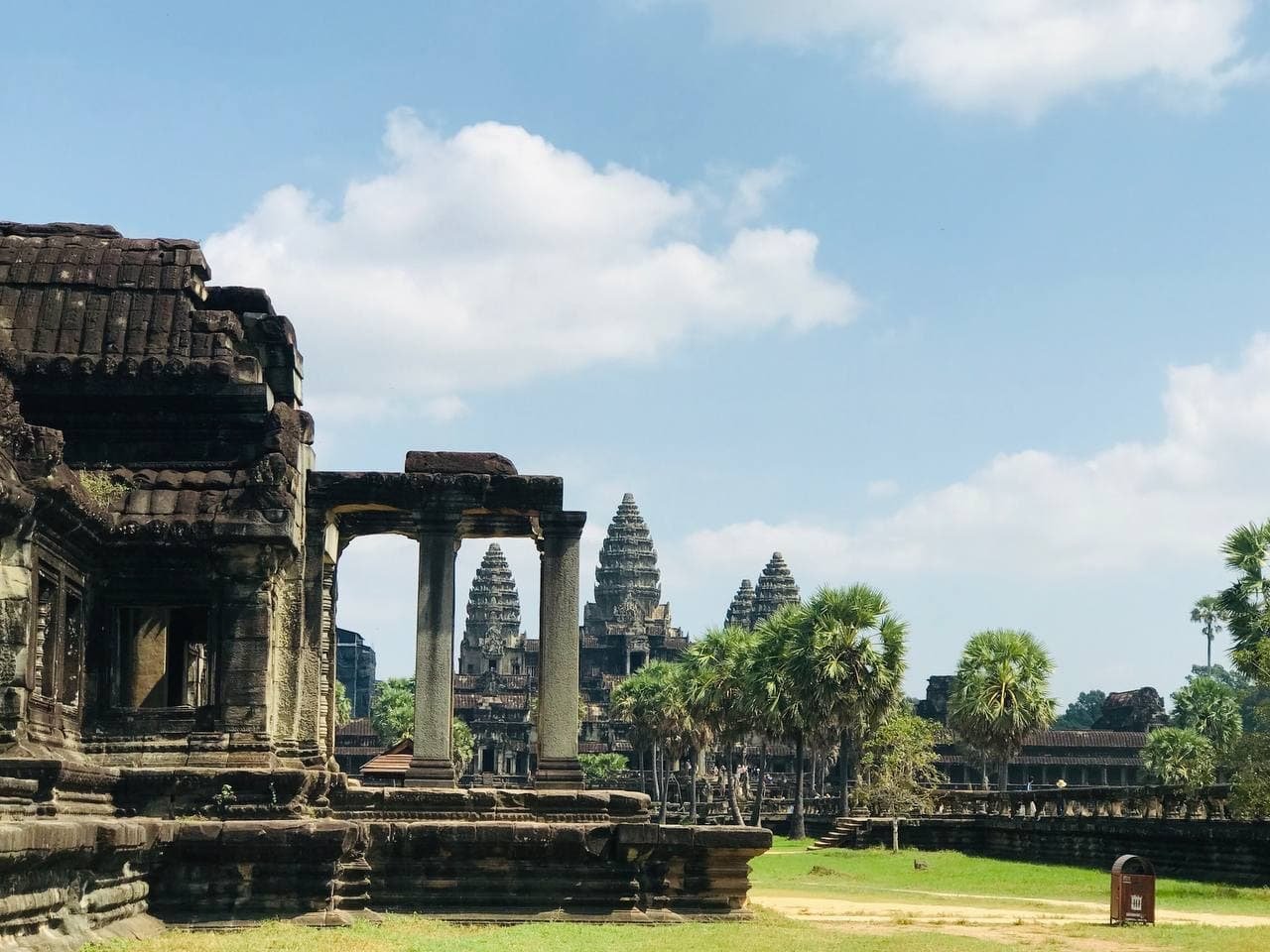 Sunlight through the stone galleries of an Angkor temple